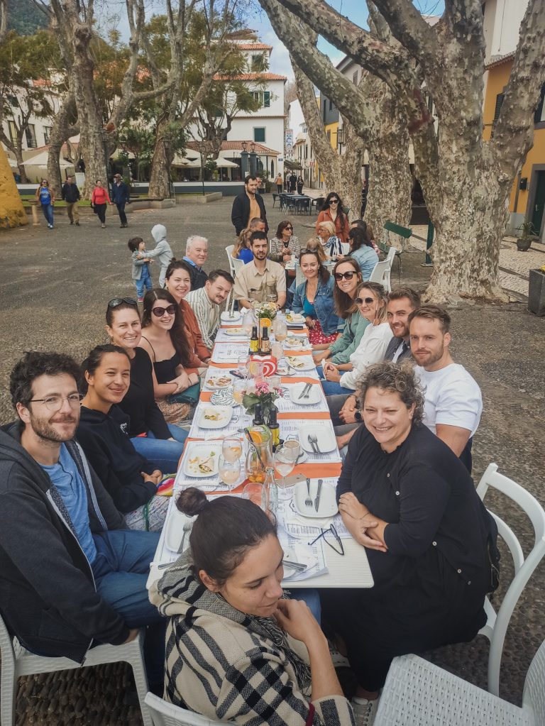 Community dinner at a long table