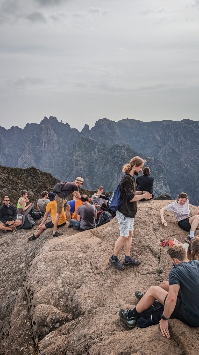 Hikers resting on a mountain top