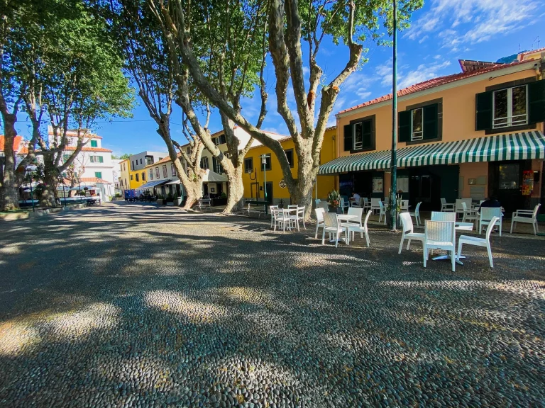 Square with cafés in Machico